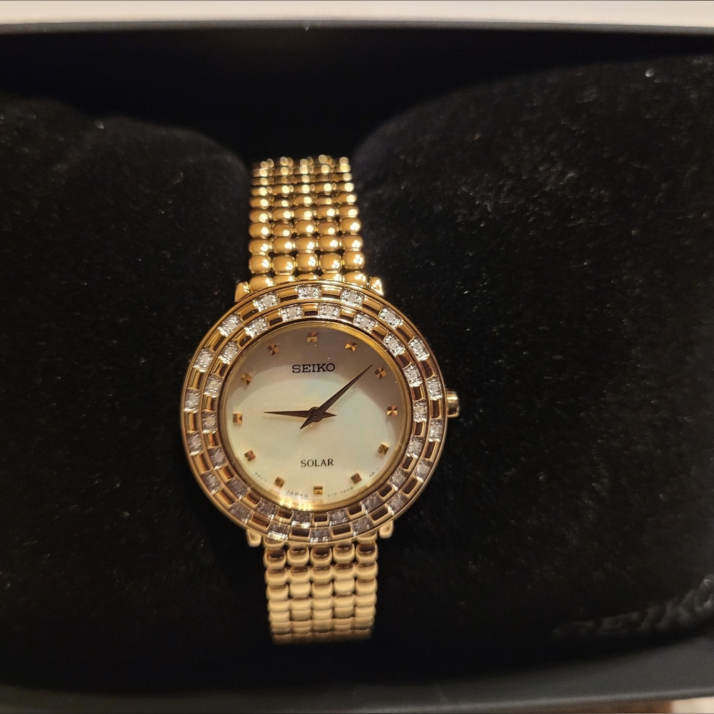Seiko Women's SUP374 TRESSIA Analog Display Japanese Quartz Gold Watch